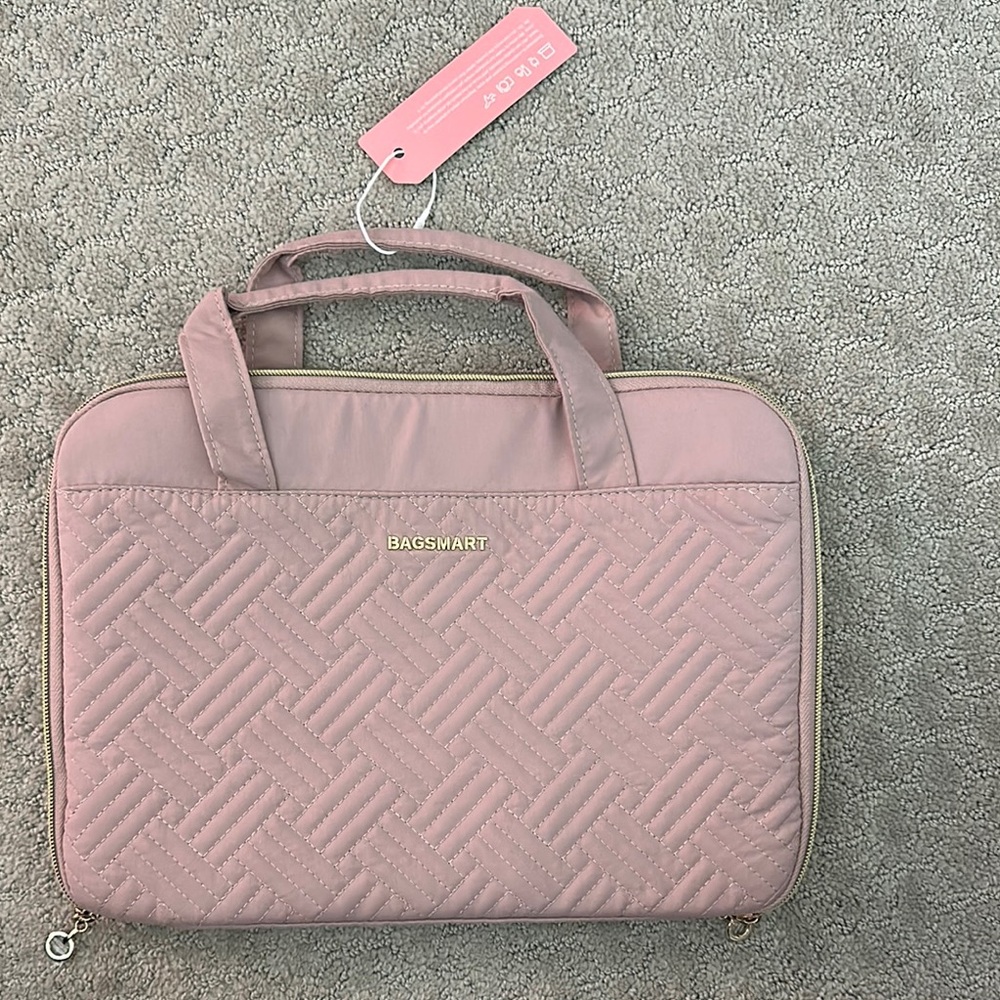 Sleek Pink Quilted Travel Bag with Sturdy Handles